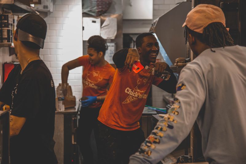 Pizza factory team enjoying a positive work environment